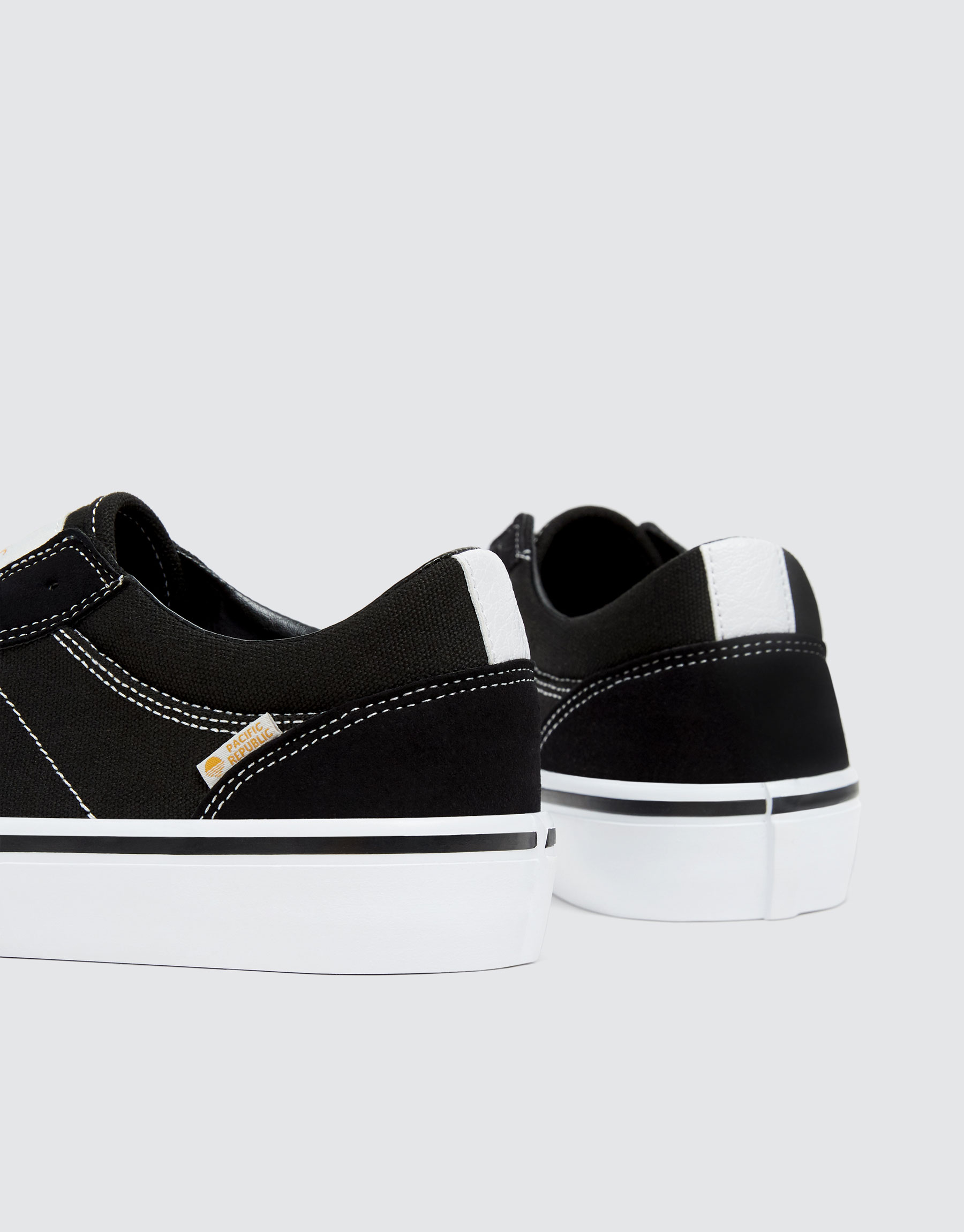 black pull on trainers