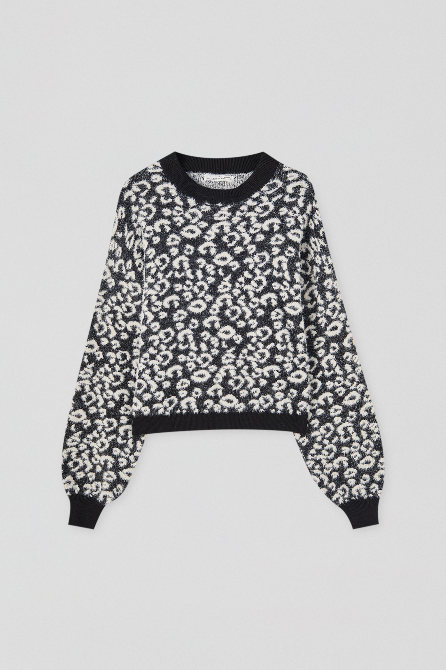 black and gray leopard print sweater