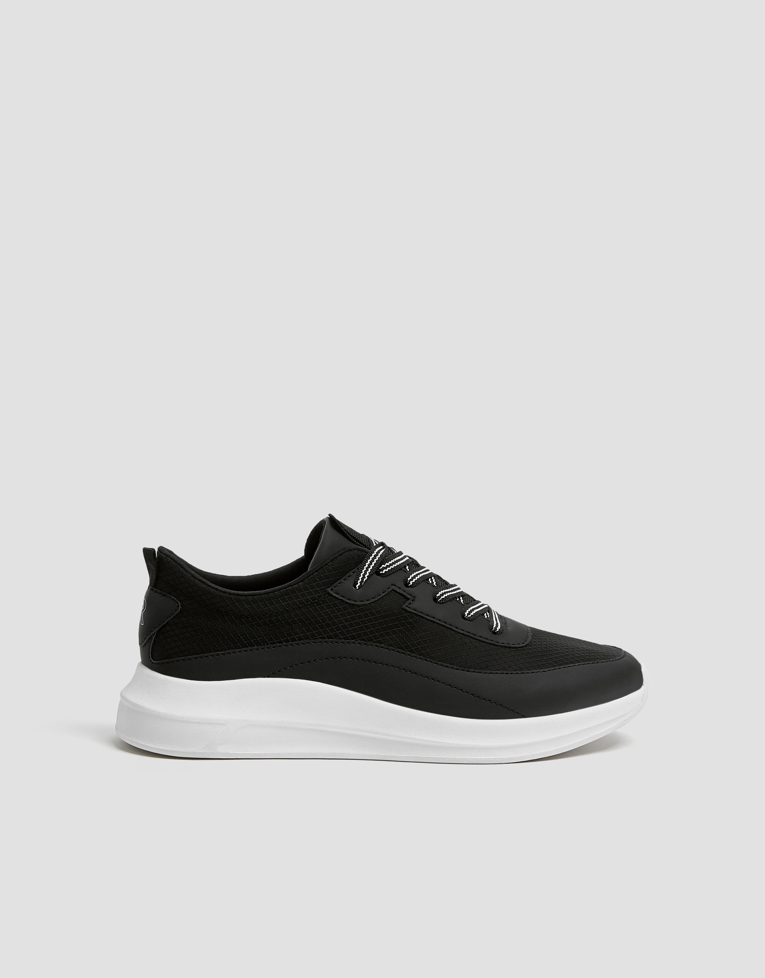 black pull on trainers