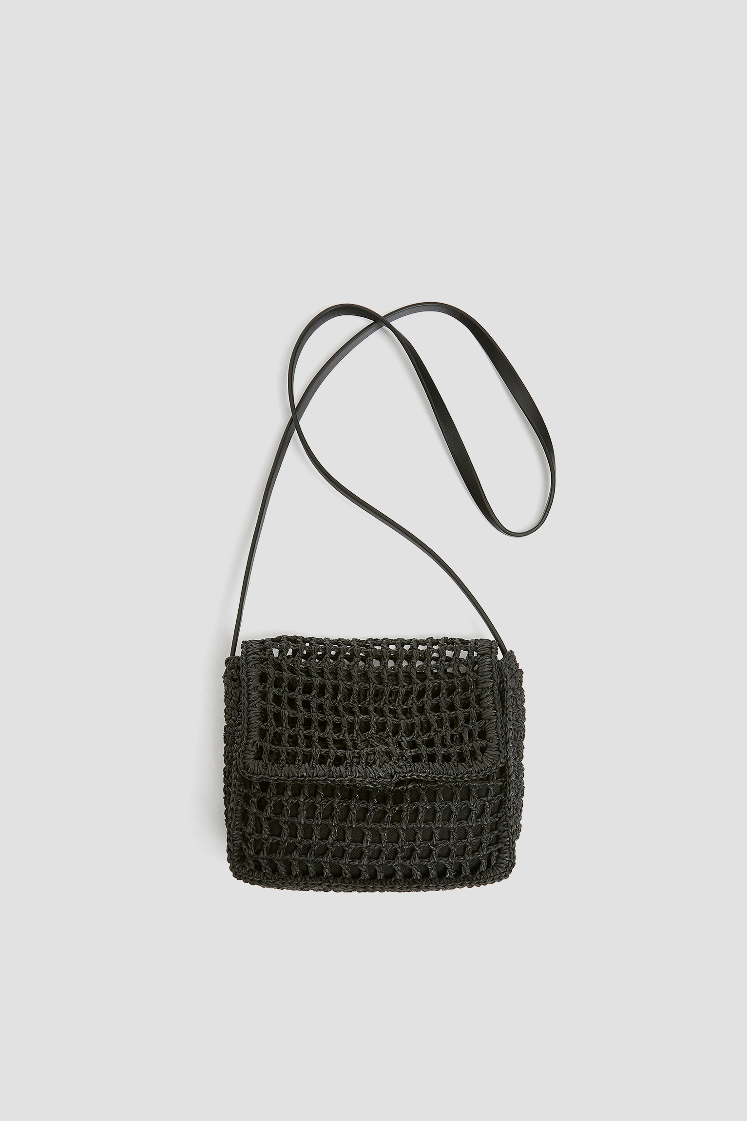 black woven crossbody bag
