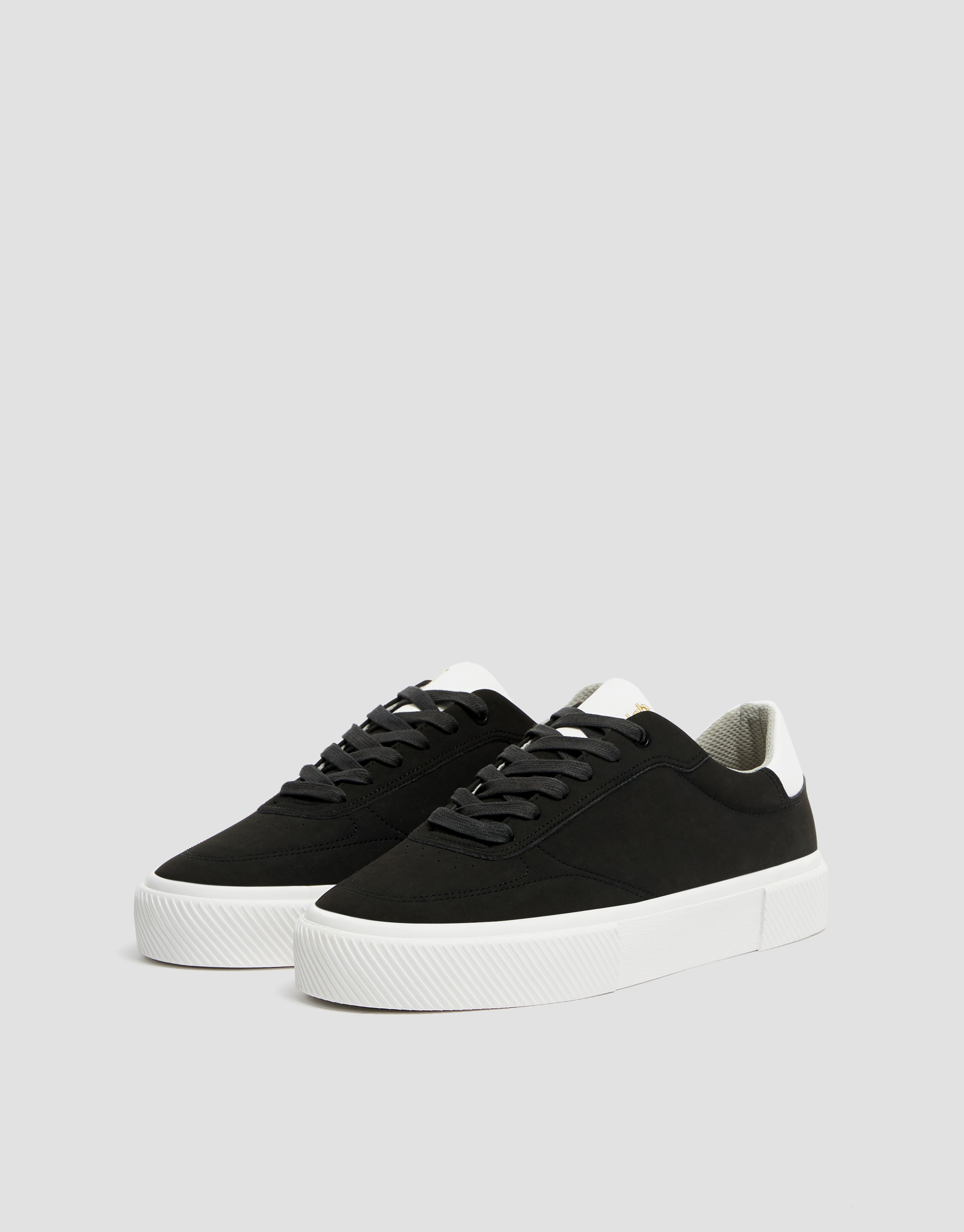 black with white sole trainers