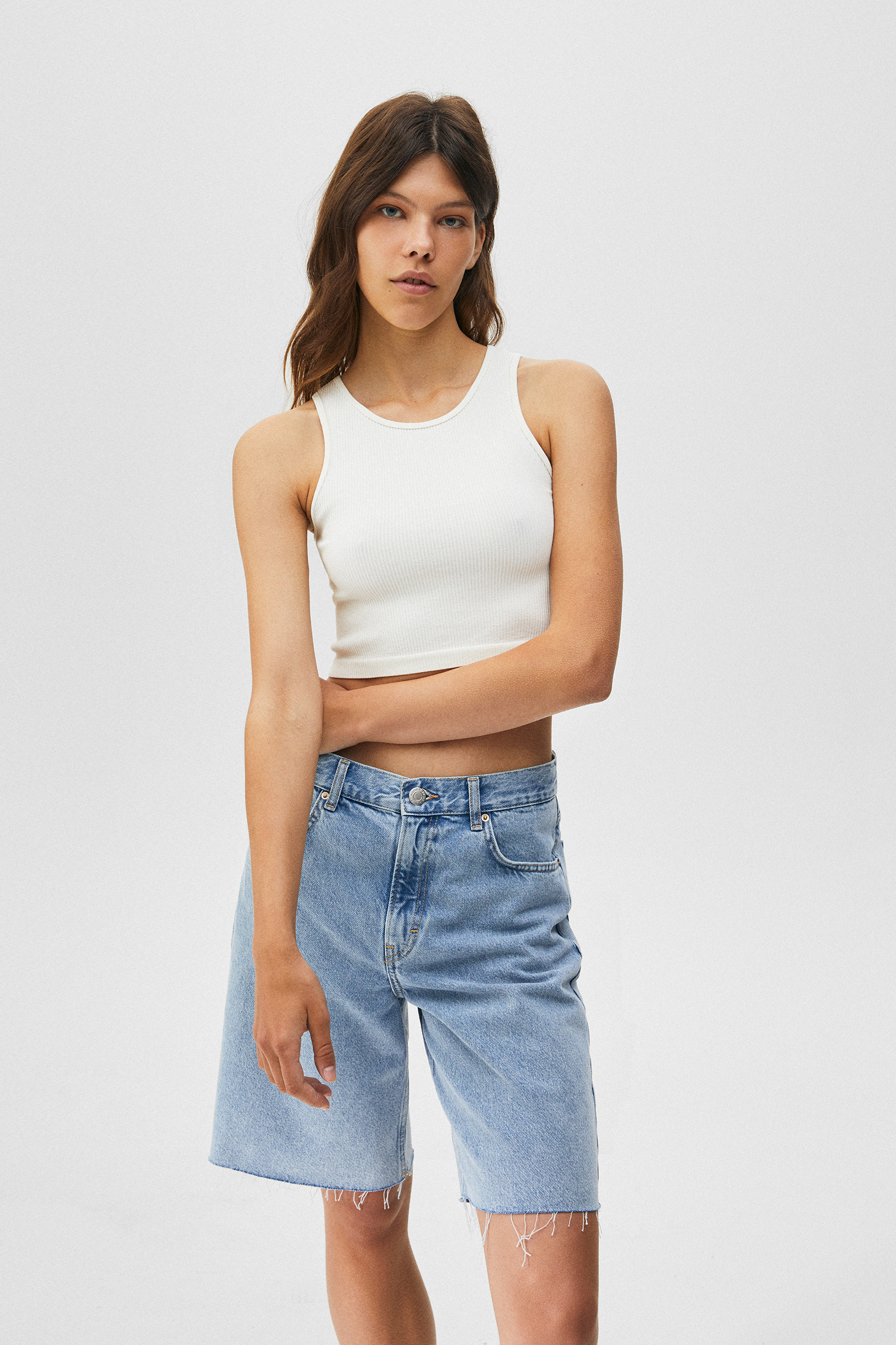 Denim Bermuda shorts with frayed hems 