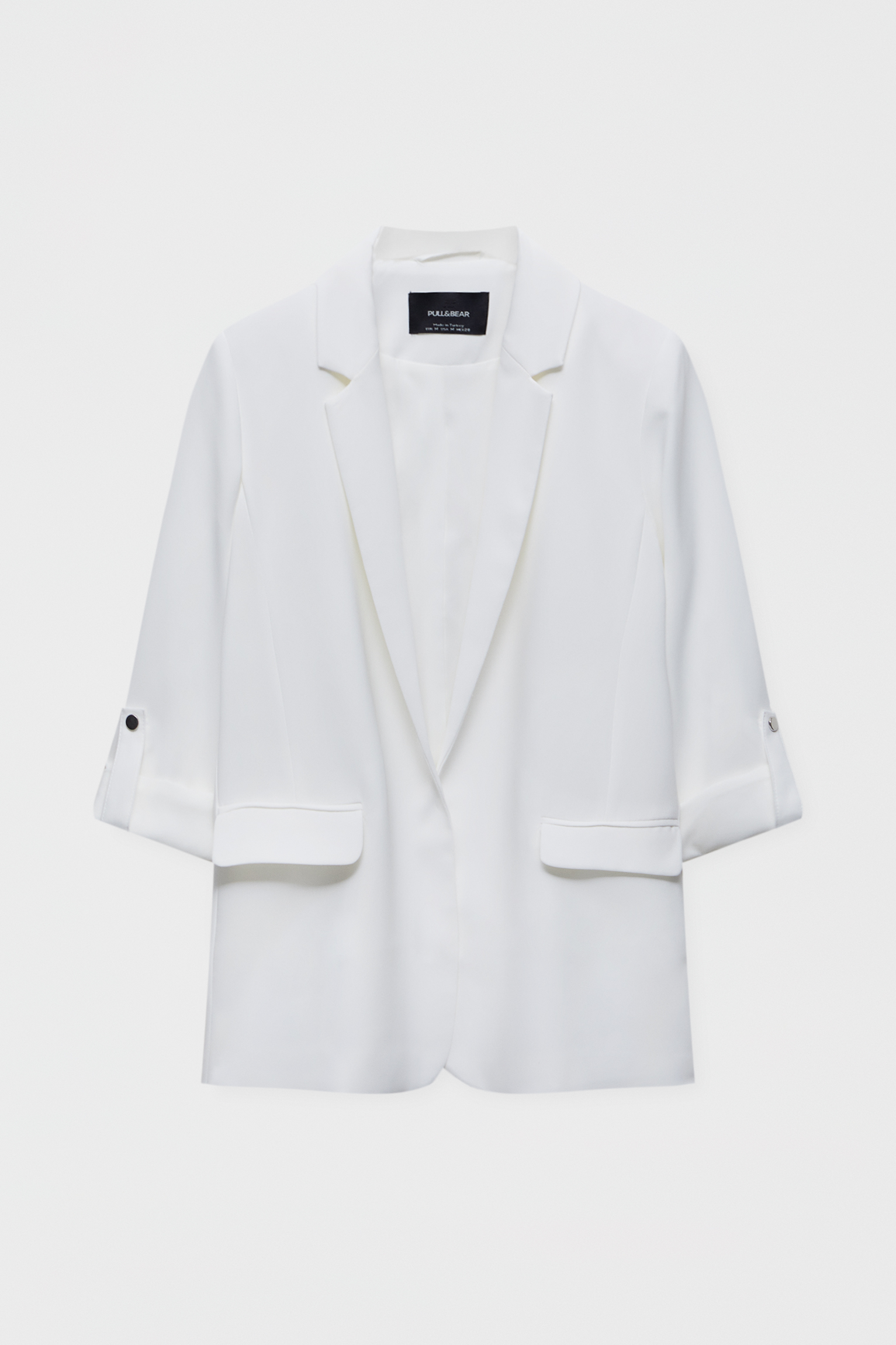 a white blazer