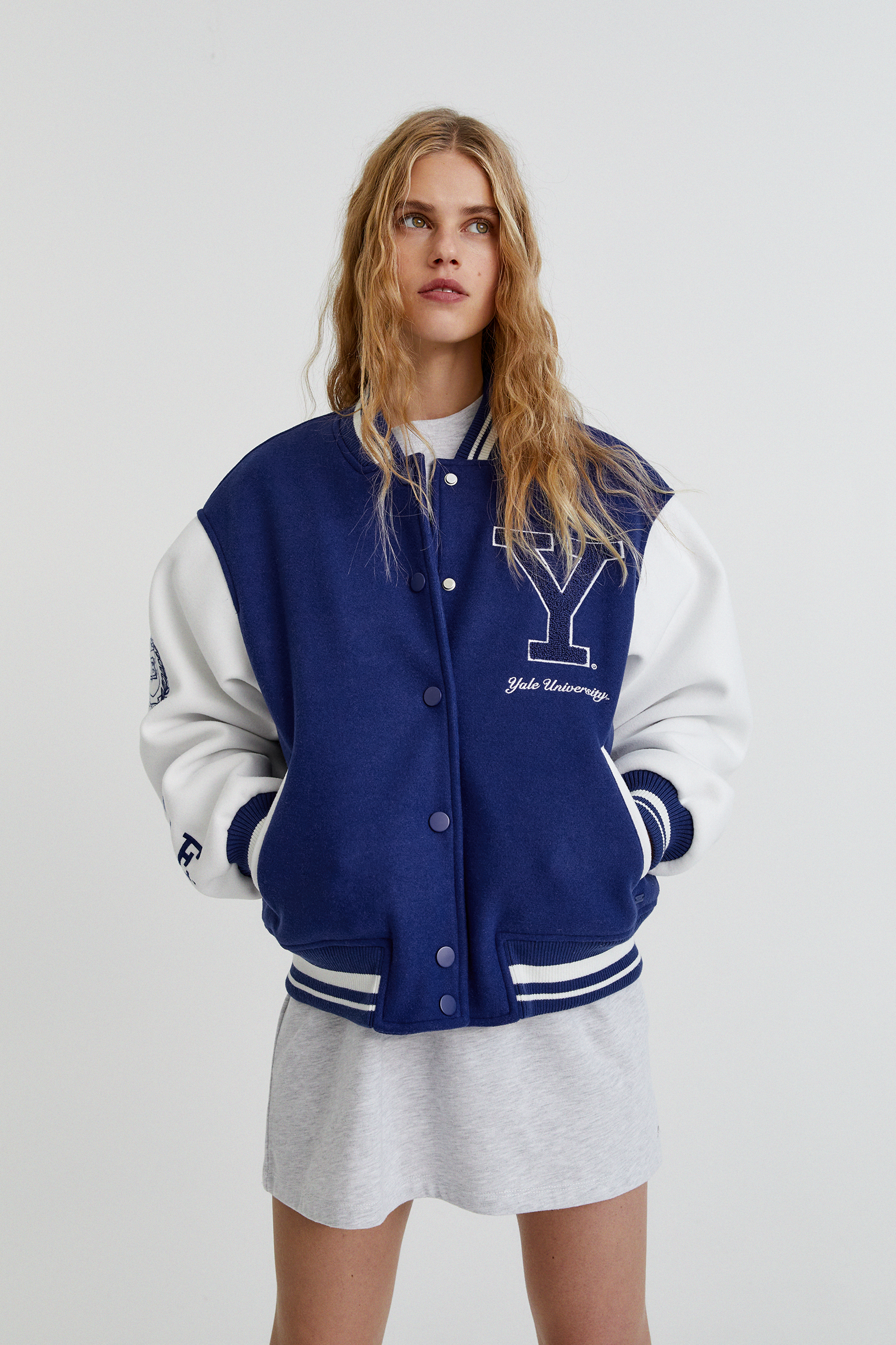 blue varsity bomber jacket