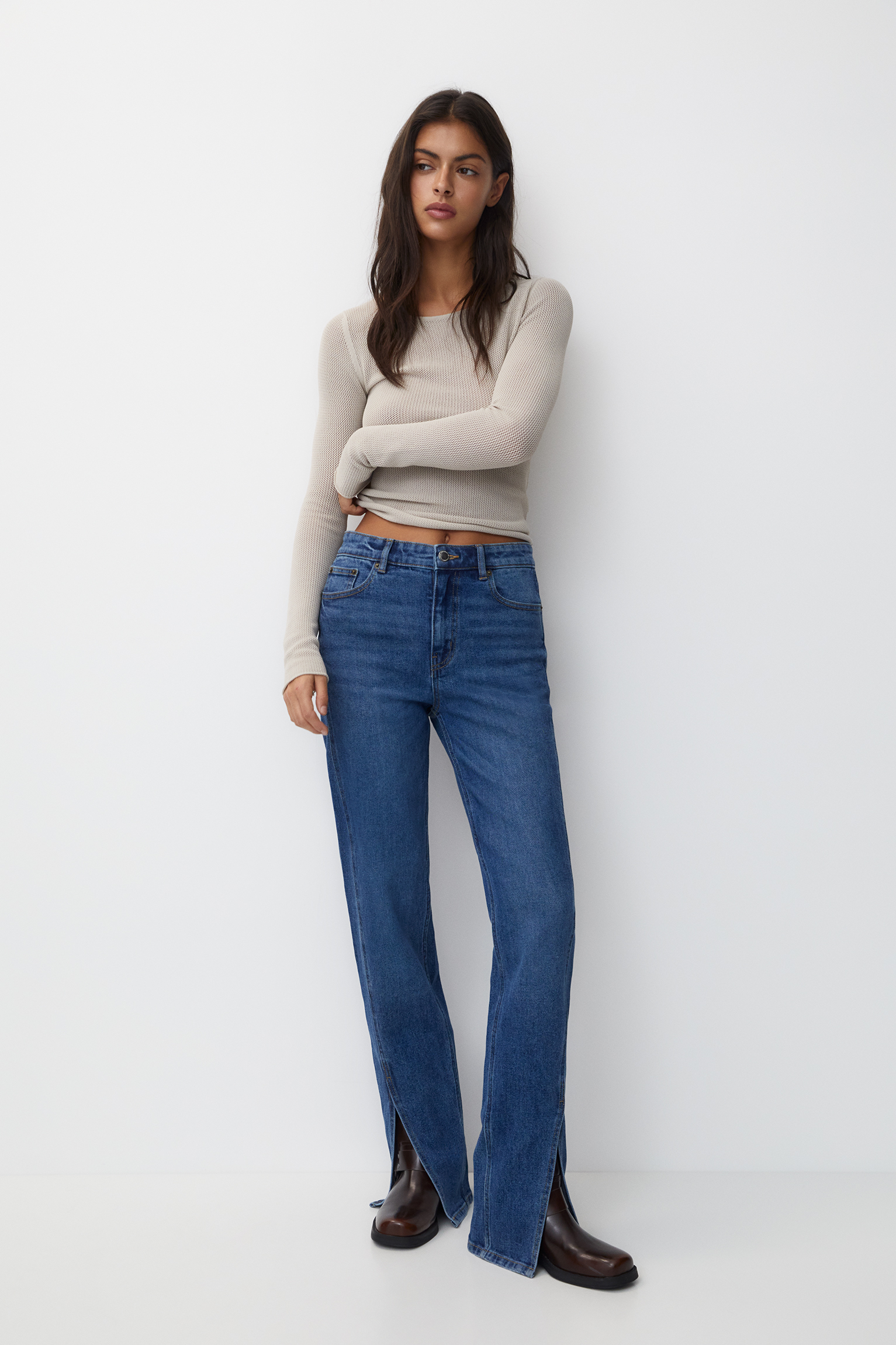 Mid-waist straight-leg jeans with front cut-out detail
