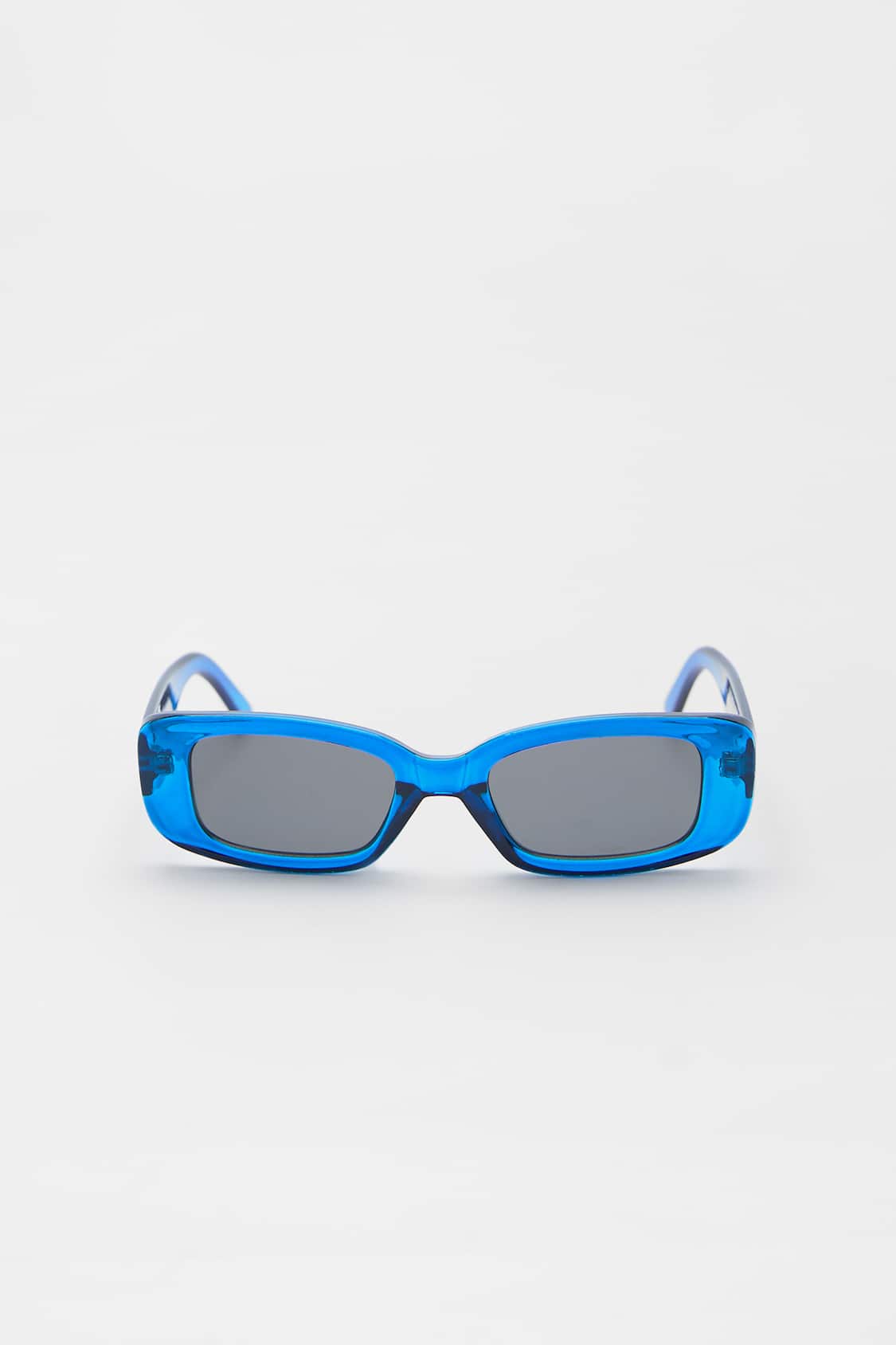 Blå, solbriller med stel i resin -