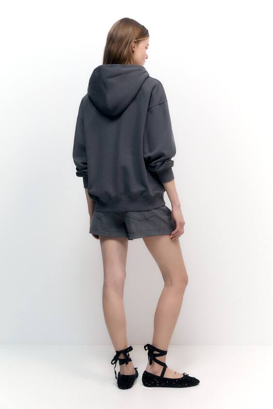 Oversize pouch pocket hoodie with flower detail