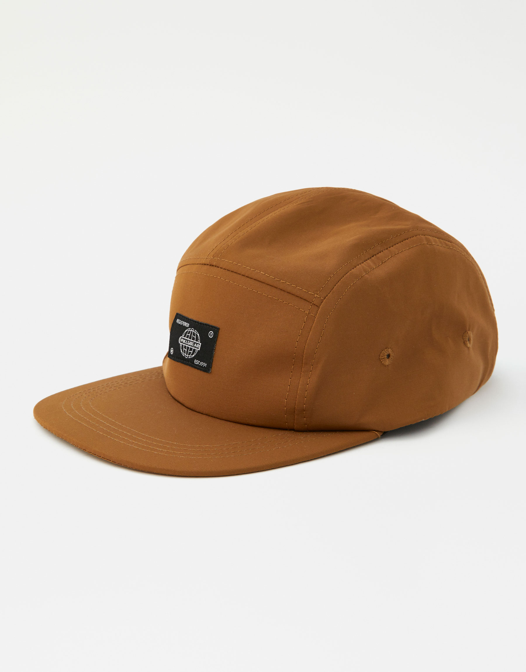 camel coloured cap