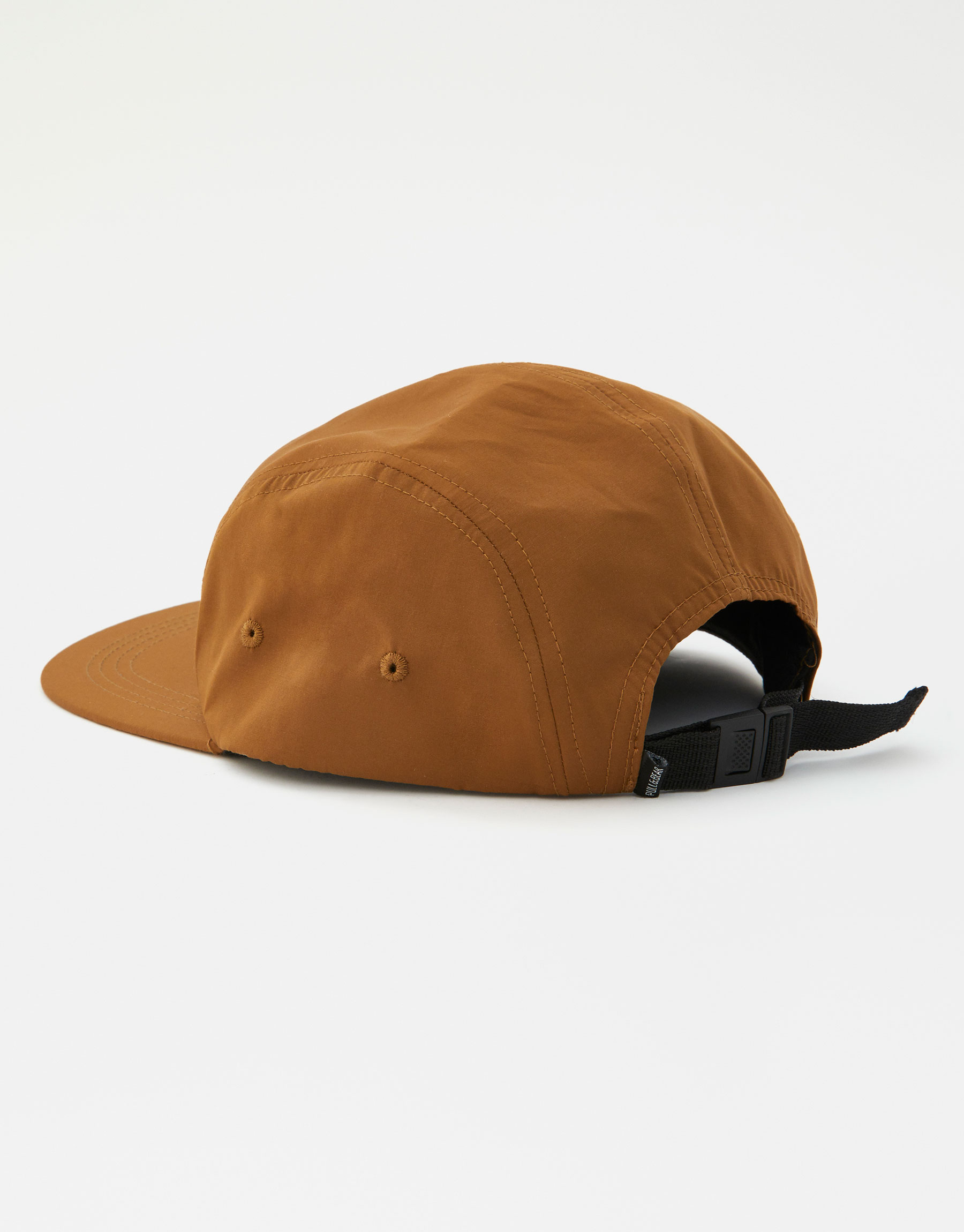 camel coloured cap