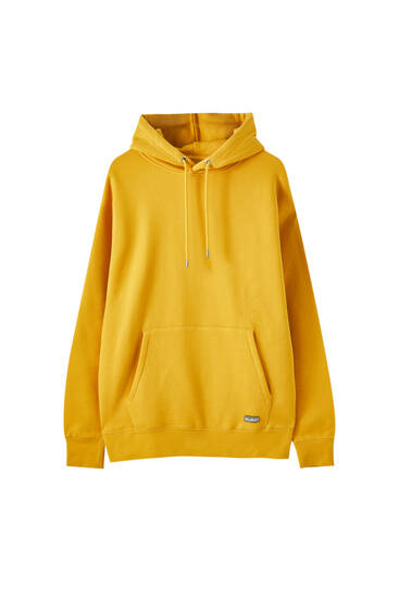 Basic hoodie with a rubberised patch 