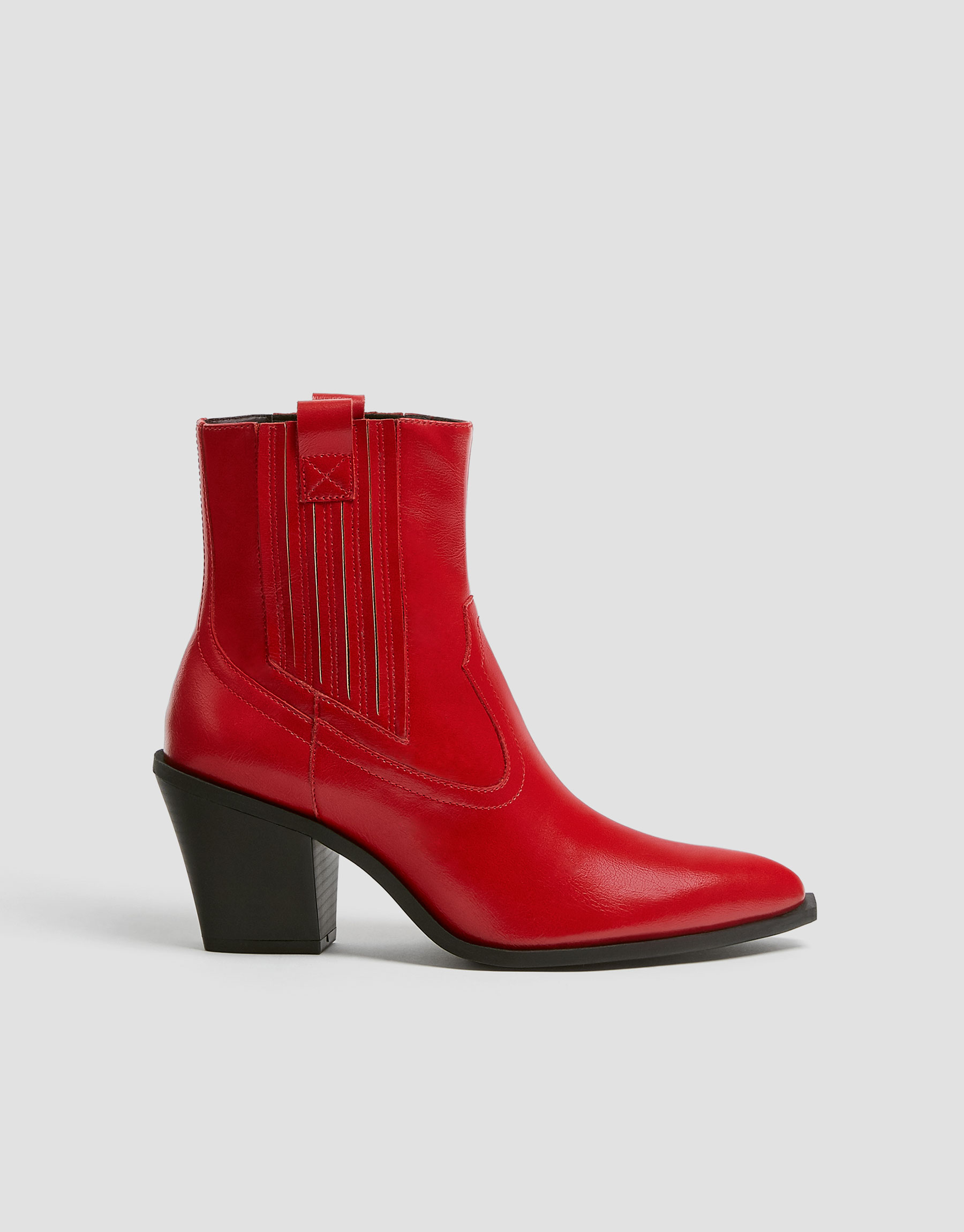 Red cowboy ankle boots with glossy finish
