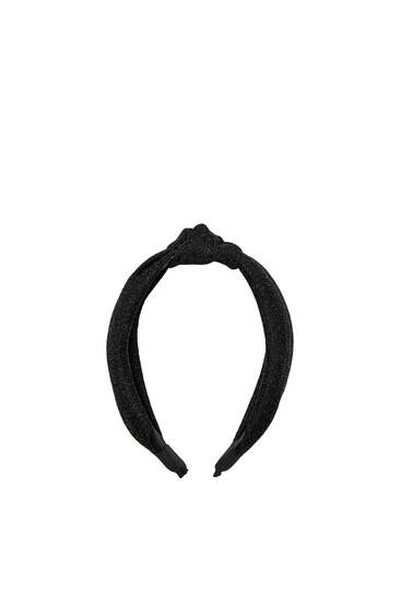 Headband with knot in shiny fabric