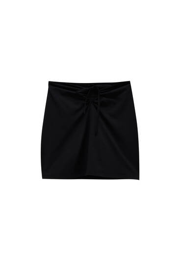 Black mini skirt with gathered front
