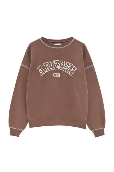 brown sweatshirt