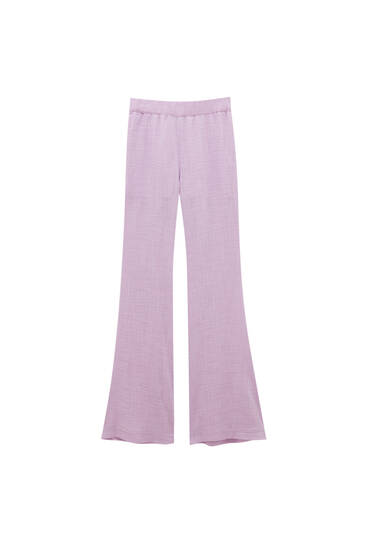 Flared trousers with an elastic waist
