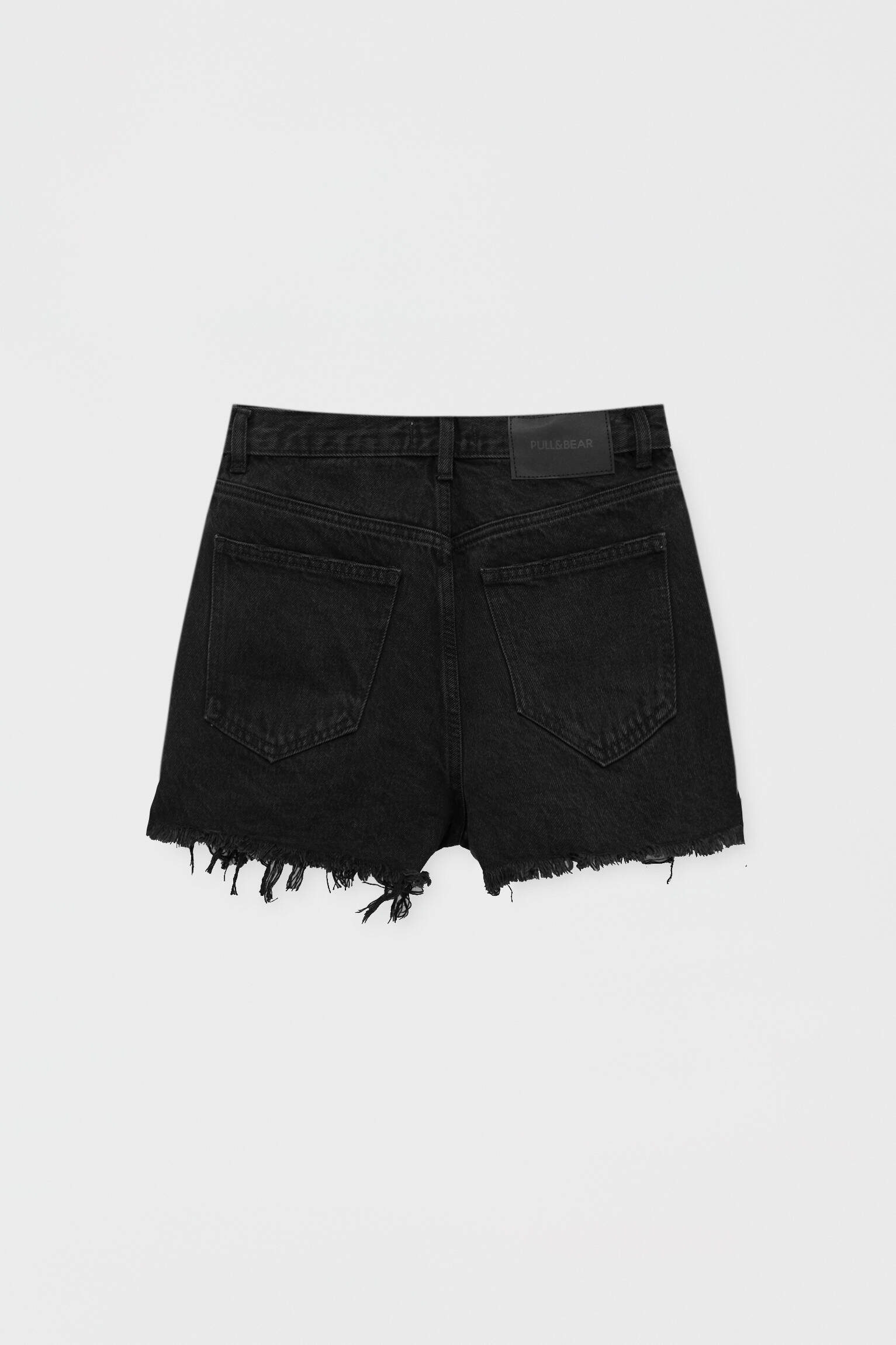 shorts de mezclilla rotos
