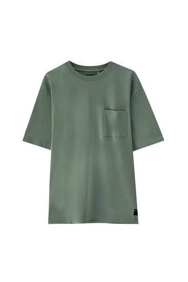 Dukslūs aukščiausios kokybės audinio marškinėliai su kišene