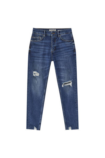 Premium fabric carrot fit jeans with ripped detailing