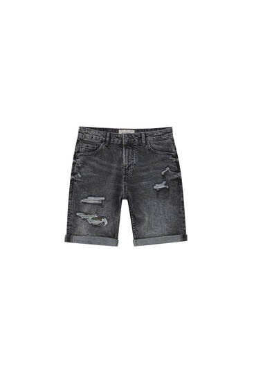 Ripped denim Bermuda shorts - Contains recycled cotton