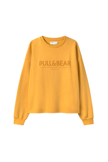 hoodie pull and bear kuning