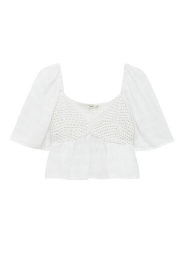 Short sleeve blouse with a crochet detail