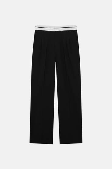 Smart trousers with turn-up waist