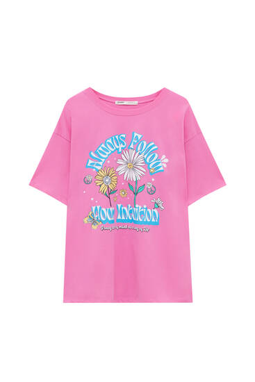 T-shirt rosa com gráfico de flores