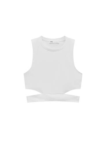 Sleeveless top with cut-out detail at the waist