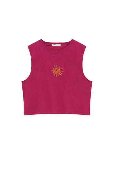Sleeveless T-shirt with an embroidered sun