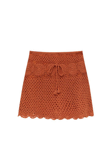 Crochet mini skirt with embroidery