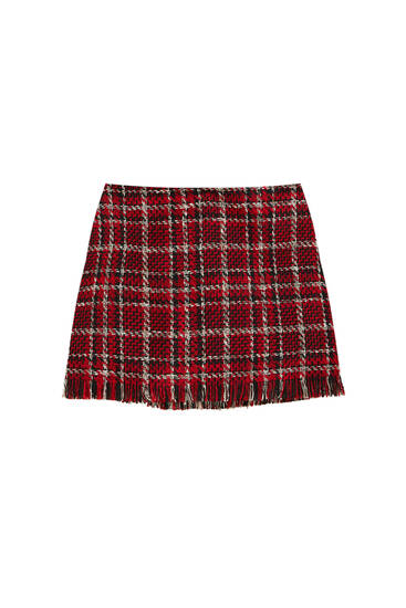 Check mini skirt with fringe