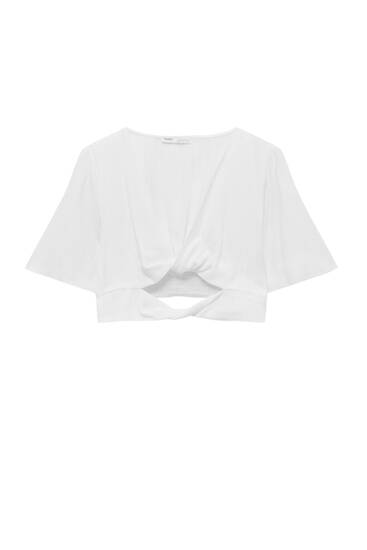Bluză albă cropped cu noduri