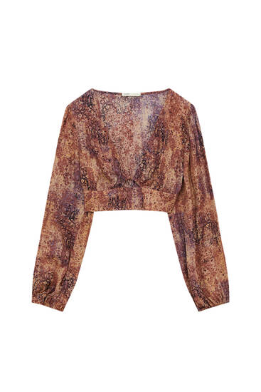 Printed blouse with voluminous sleeves