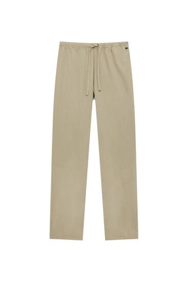 Loose-fitting, rustic fabric trousers