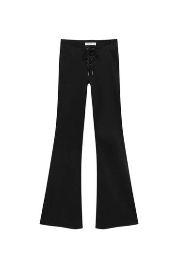 Flare trousers with lace-up detail