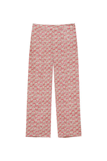 Loose-fitting trousers with geometric print
