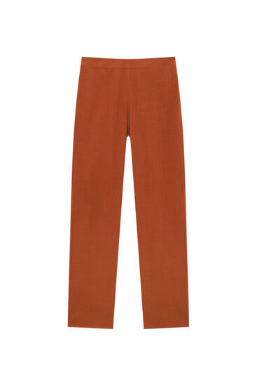 Pantaloni rustici colorați
