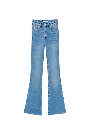 Flare jeans met hoge taille en split in de zoom