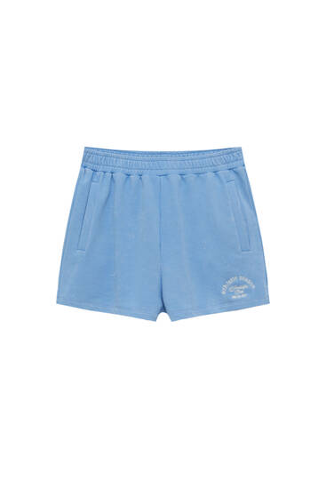 Sweat shorts with embroidered slogan 