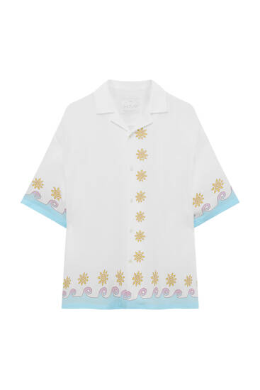 Short sleeve shirt with suns and waves