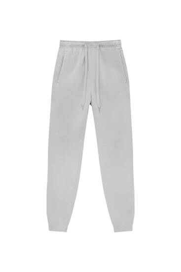 Faded jogging trousers