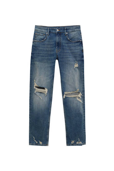 Jeans skinny fit detalle rotos tela premium