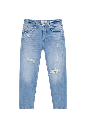 Jeans carrot fit detalle rotos pernera