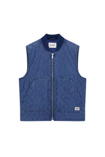 Gilet with quilted interior