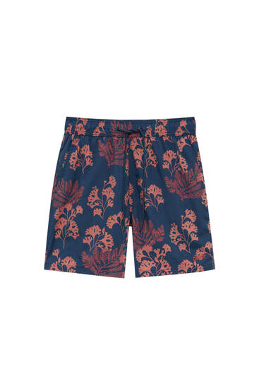 Coral print swimming trunks