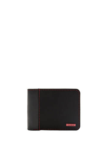 Black wallet with stitched detail
