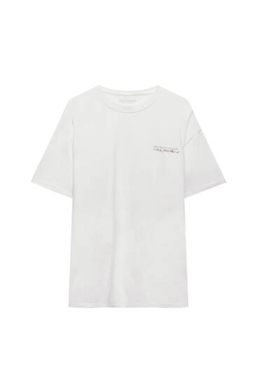 White short sleeve T-shirt with front slogan