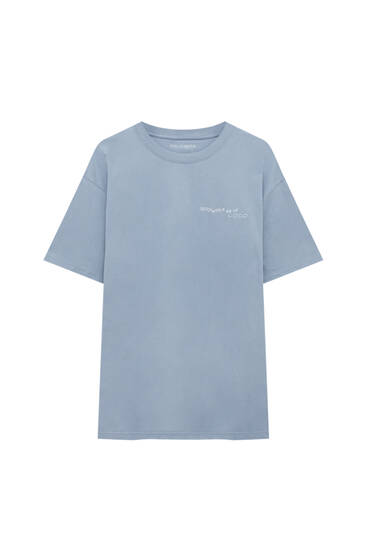 T-shirt bleu manches courtes inscription devant