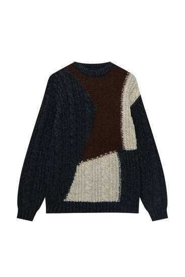 Pletený sveter z káblového úpletu