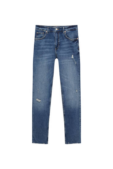 Jeans skinny fit básicos detalle rotos